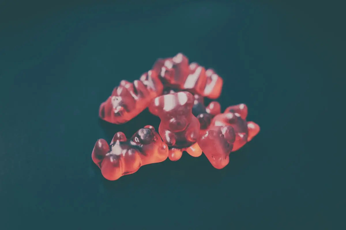 a group of gummy bears sitting on top of a table